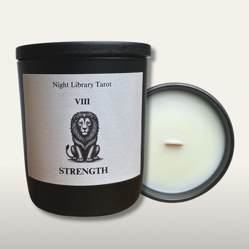 Candle with a label featuring a lion illustration and text on a white background