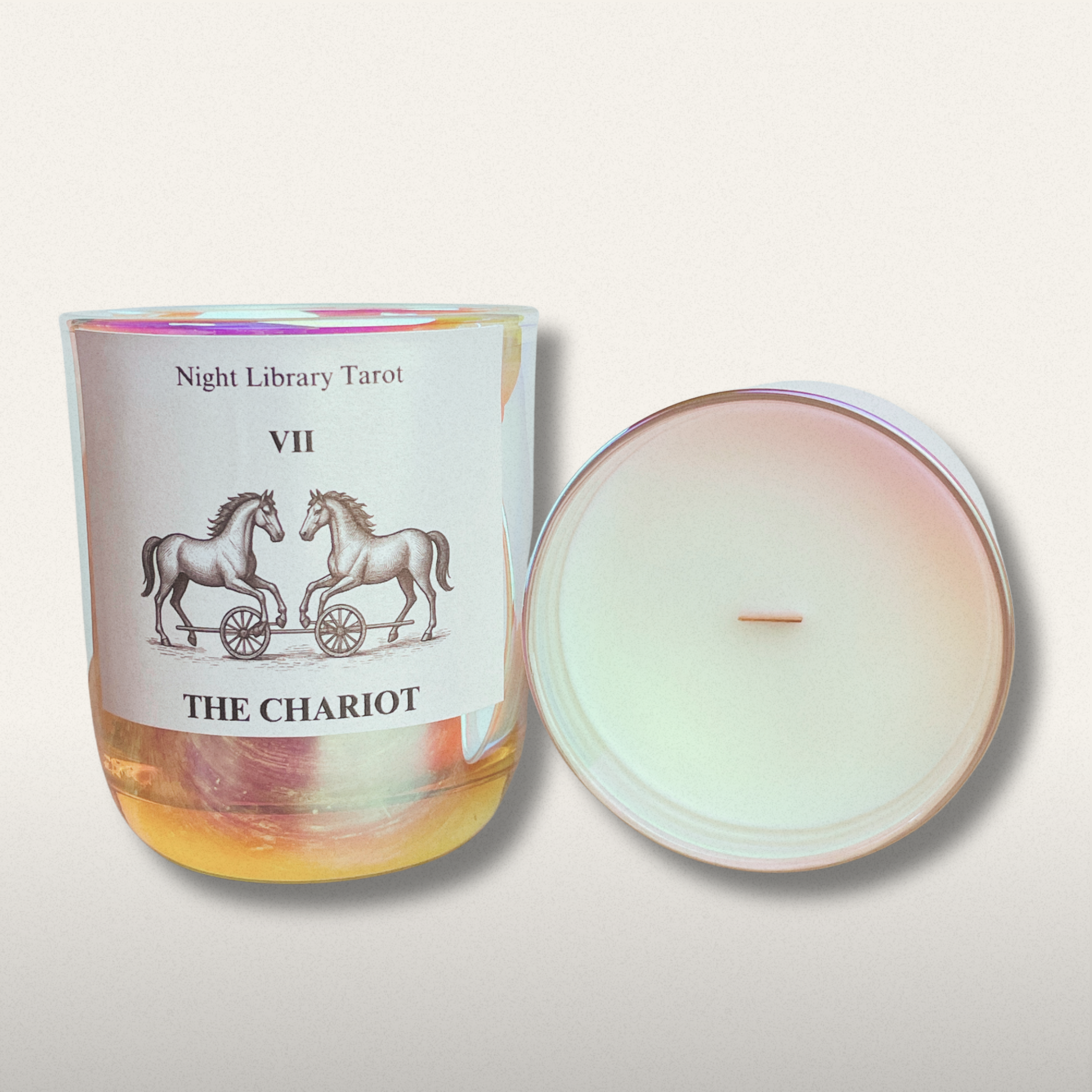 Candle with 'The Chariot' tarot card design on a white background