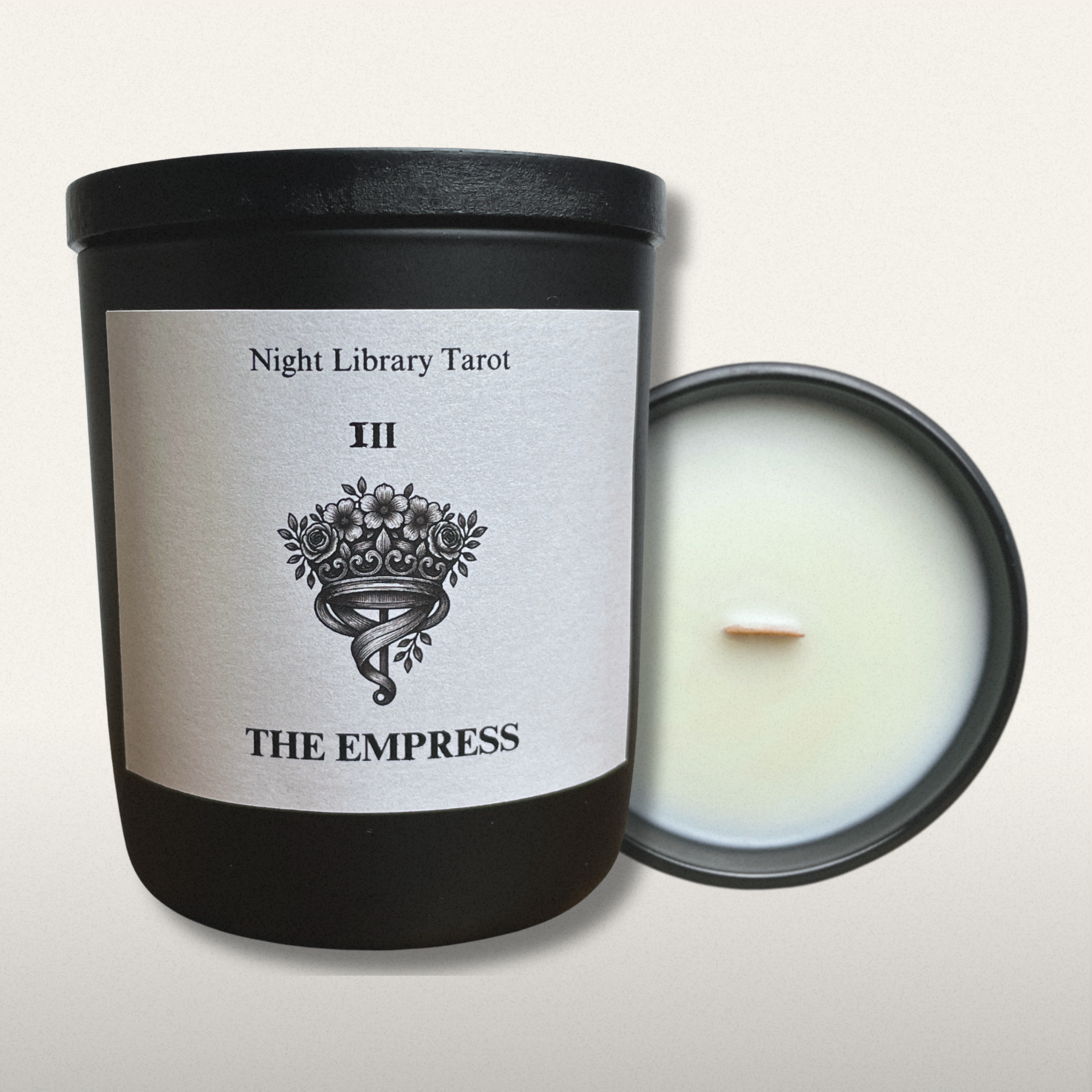 Candle with 'The Empress' tarot card design on a white background