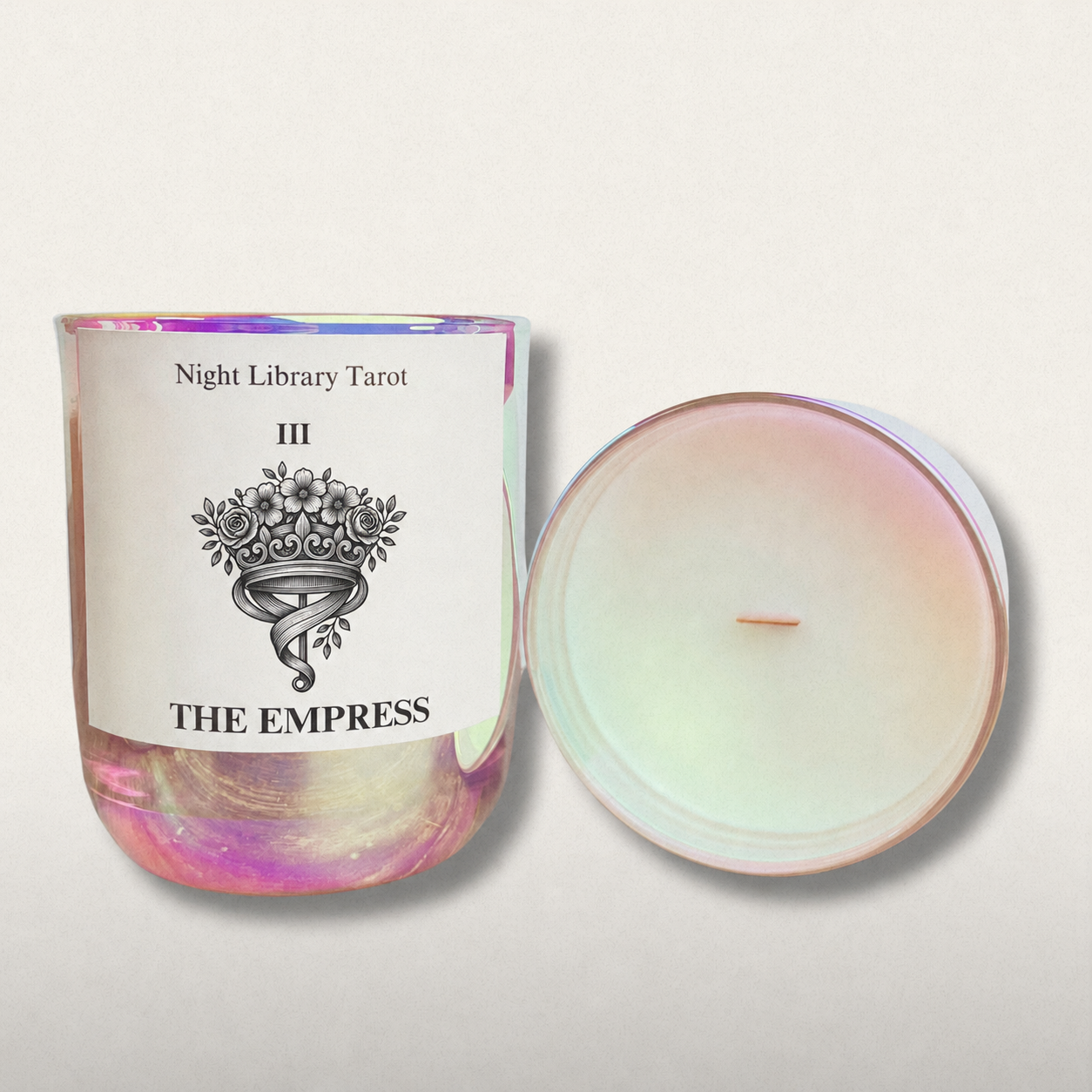 Candle with 'The Empress' tarot card design and 'Night Library Tarot' text on a light background