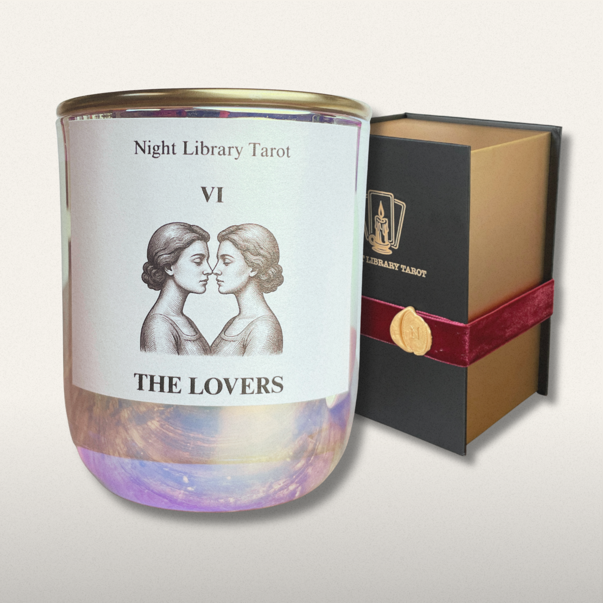Candle with 'The Lovers' design and packaging on a white background