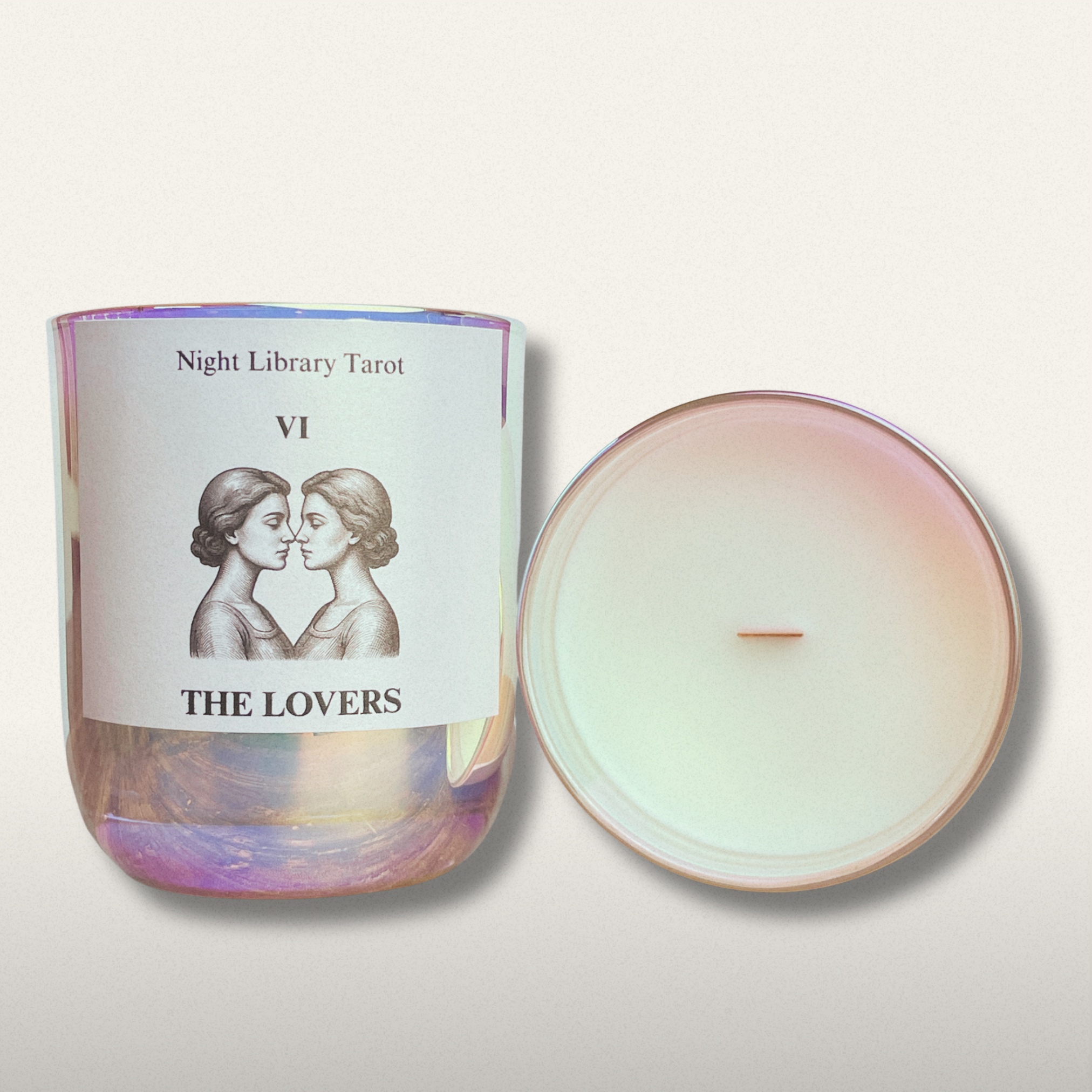Candle with 'The Lovers' tarot card design on a white background