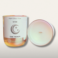 Candle with 'The Moon' label from Night Library Tarot on a light background